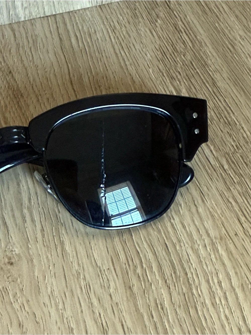 Ray-Ban Black Frame Sunglasses with Dark Lenses